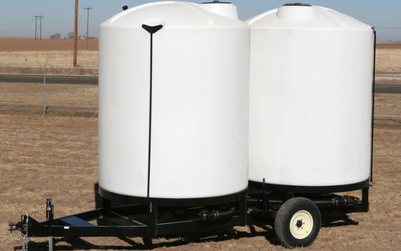 DOT-compliant double cone bottom water tank trailer with dual 3,000 gallon tanks