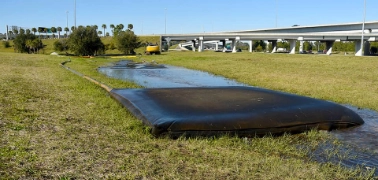 Dewatering silt bag staged on roadside