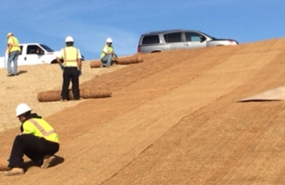 Coir erosion control blankets and wattles on a municipal slope