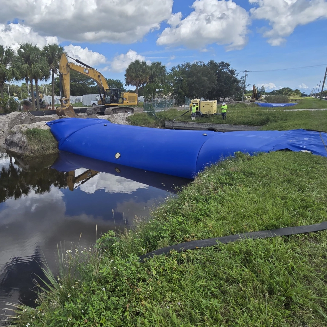 blue cofferdam near construction site