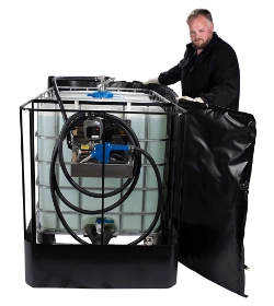man wrapping an ibc tote with a powerblanket