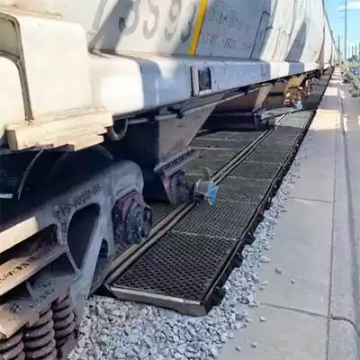 Pellet pan installed on a railroad