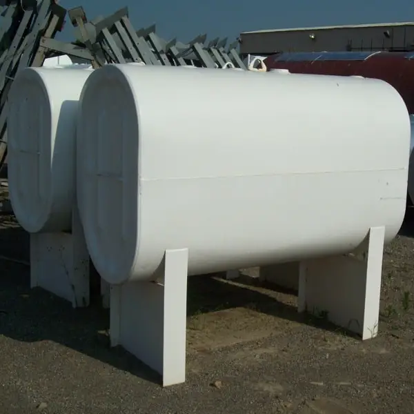 2 white obround heating oil tanks