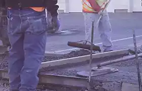 Men working on concrete